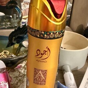 Ajwad Gold Fragrance Spray - Gold with Red Accent